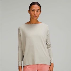 Lululemon back in action long sleeve. Light cream/tan color.